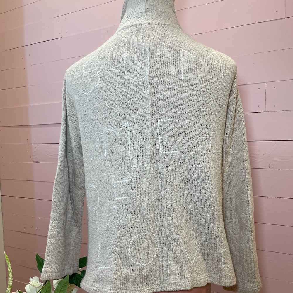 SUNDRY Tan Knit Sweater with summer of love stitching
BAG 2